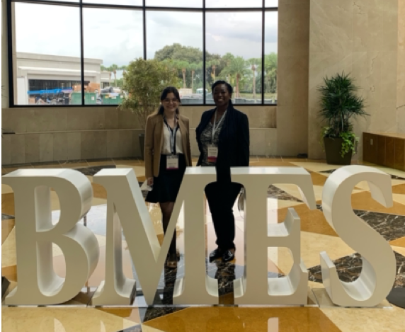 Ozgenur and Tolu with the BMES sign